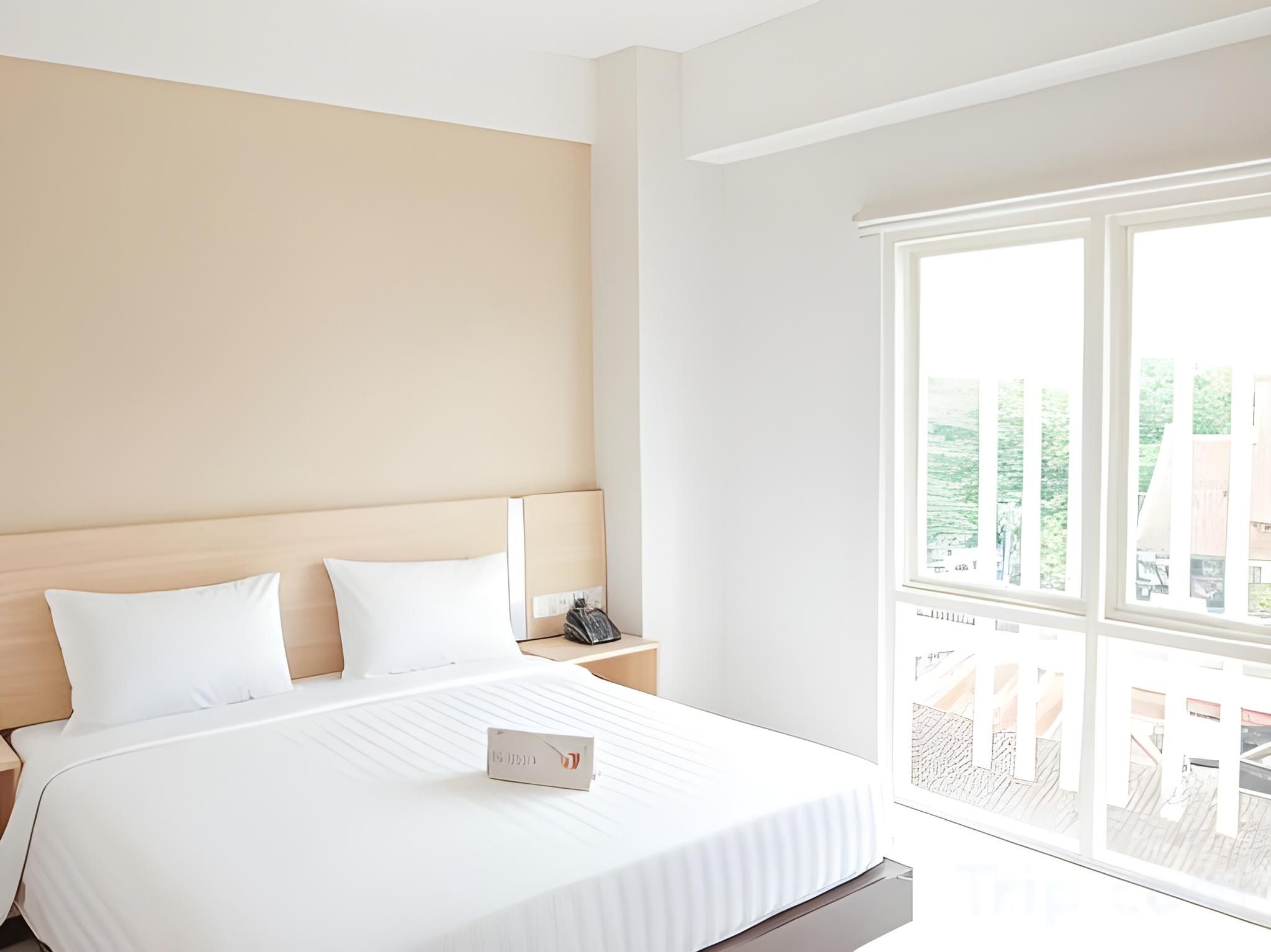 Whiz Prime Hotel Sudirman Makassar Superior Queen Bed 2