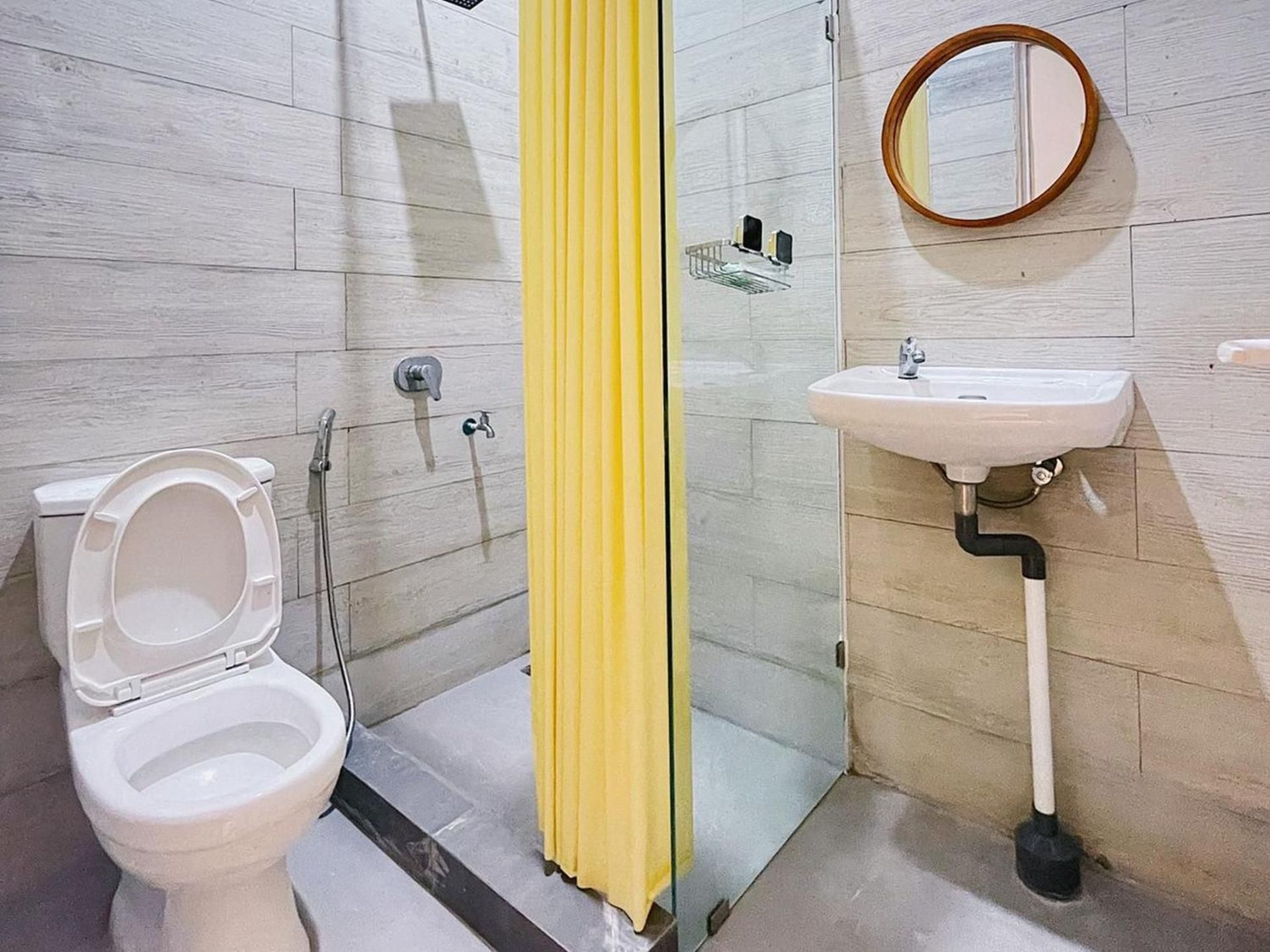 Urbanview Hotel Wollangi Syariah Panakkukang Makassar Deluxe Twin Room 2