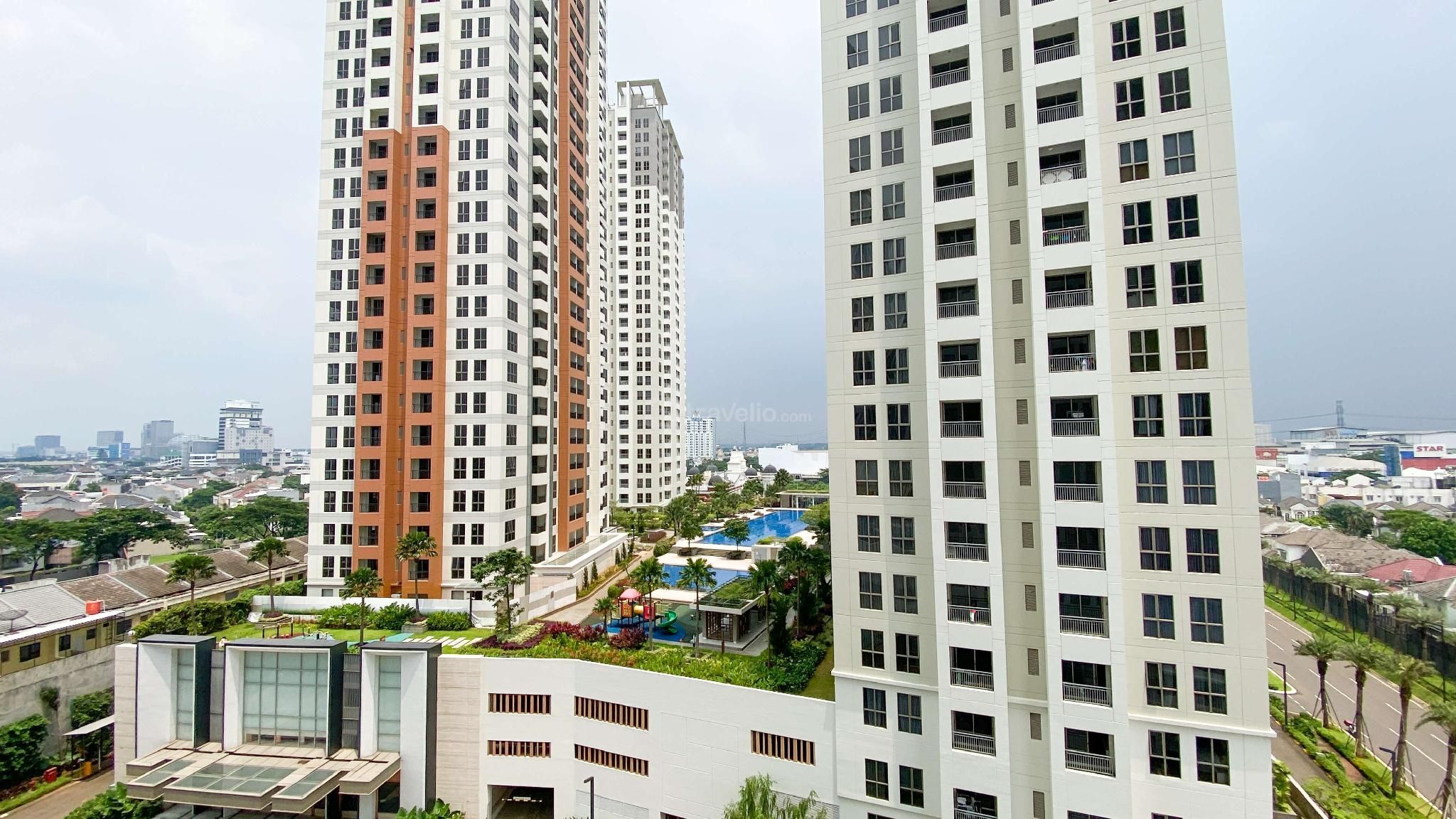 Homey 2BR Apt at M-Town Residence By Travelio