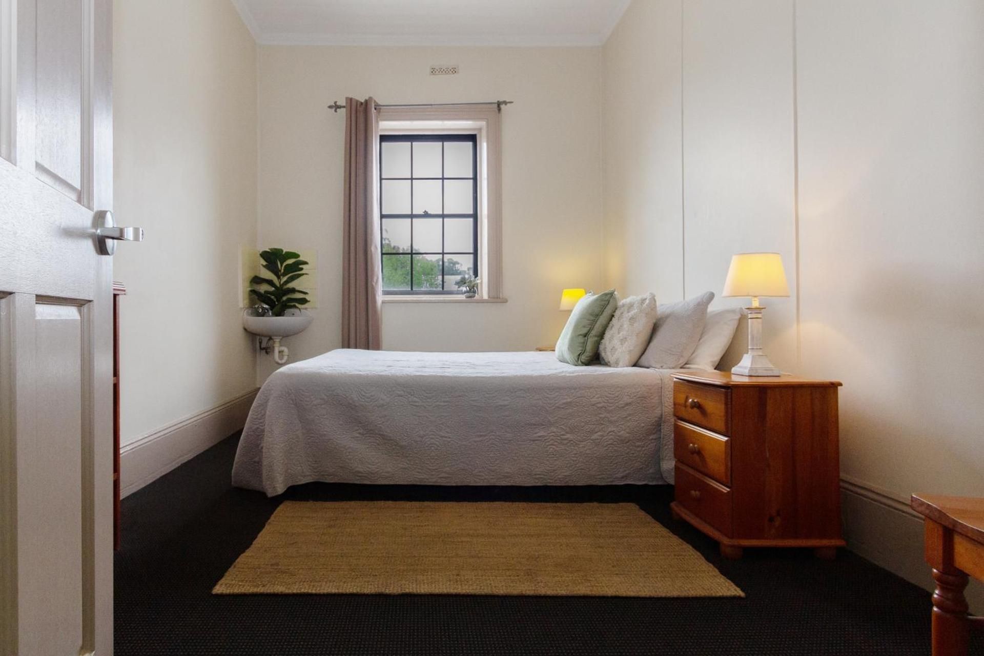 Queen Room with Shared Bathroom
