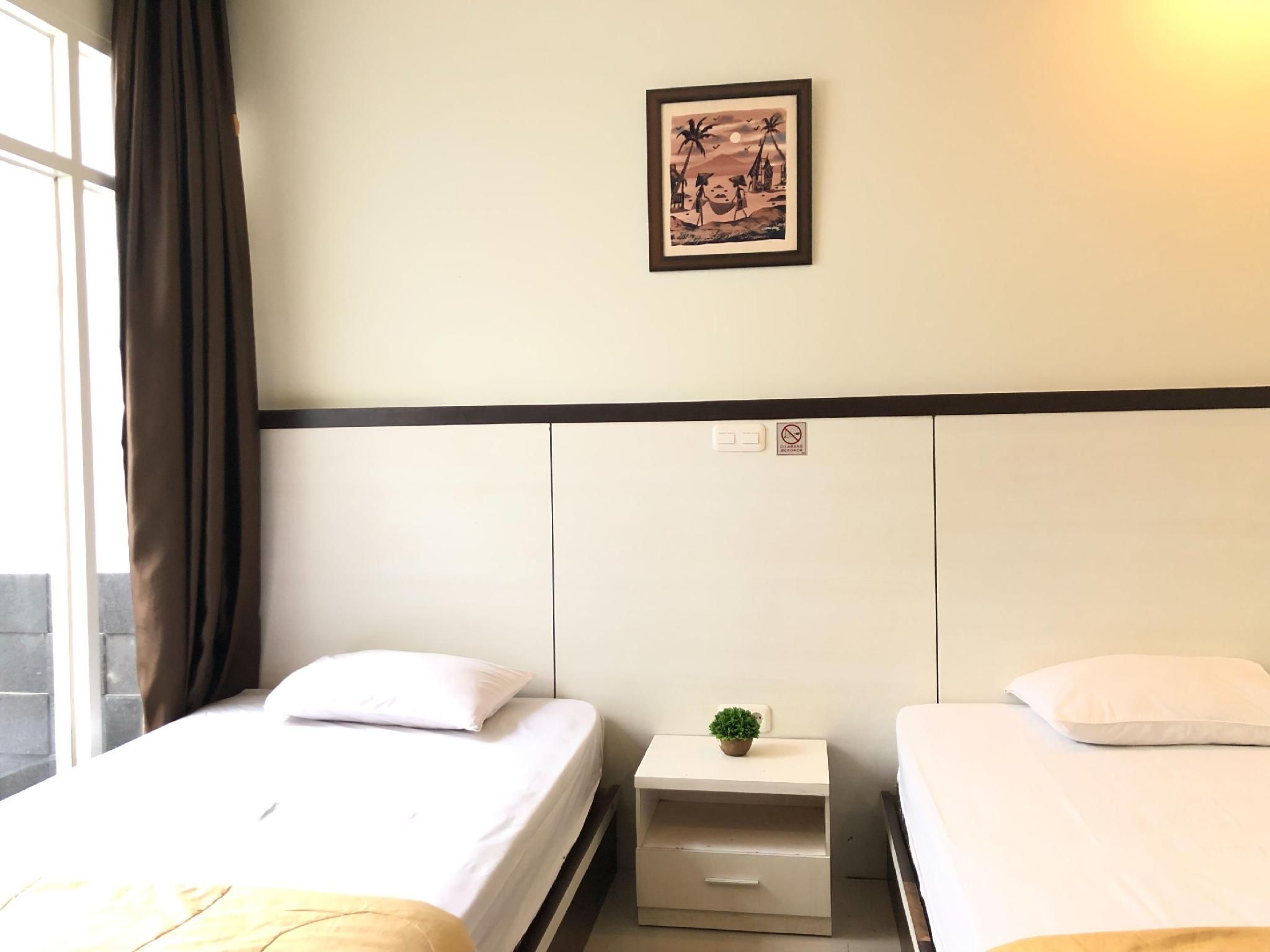 RedDooz Plus @ Ininnawa Homestay Palu Twin Room 2