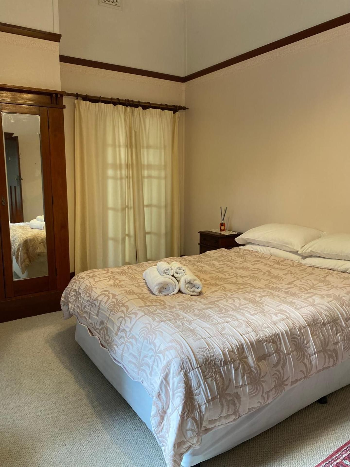 Queen Room with Shared Bathroom