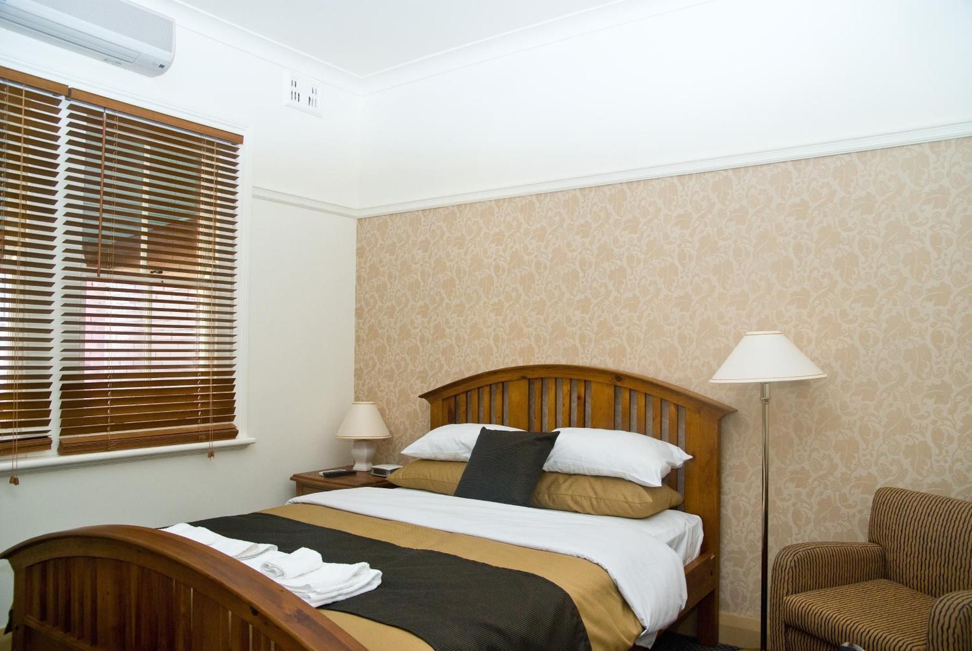 Queen Room with Shared Bathroom