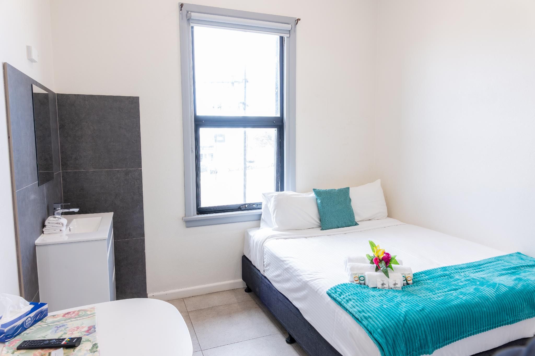 Queen Room with Shared Bathroom