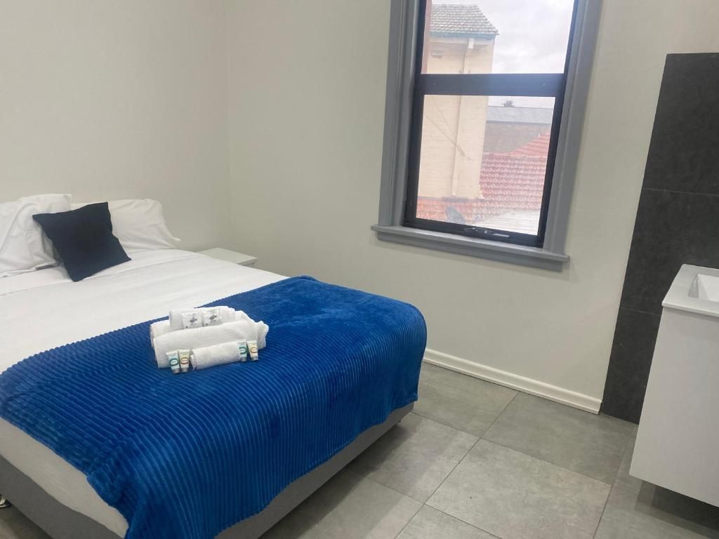 Queen Room with Shared Bathroom