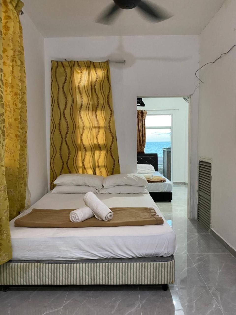 Raihan Beach Resort Deluxe Triple Room 3