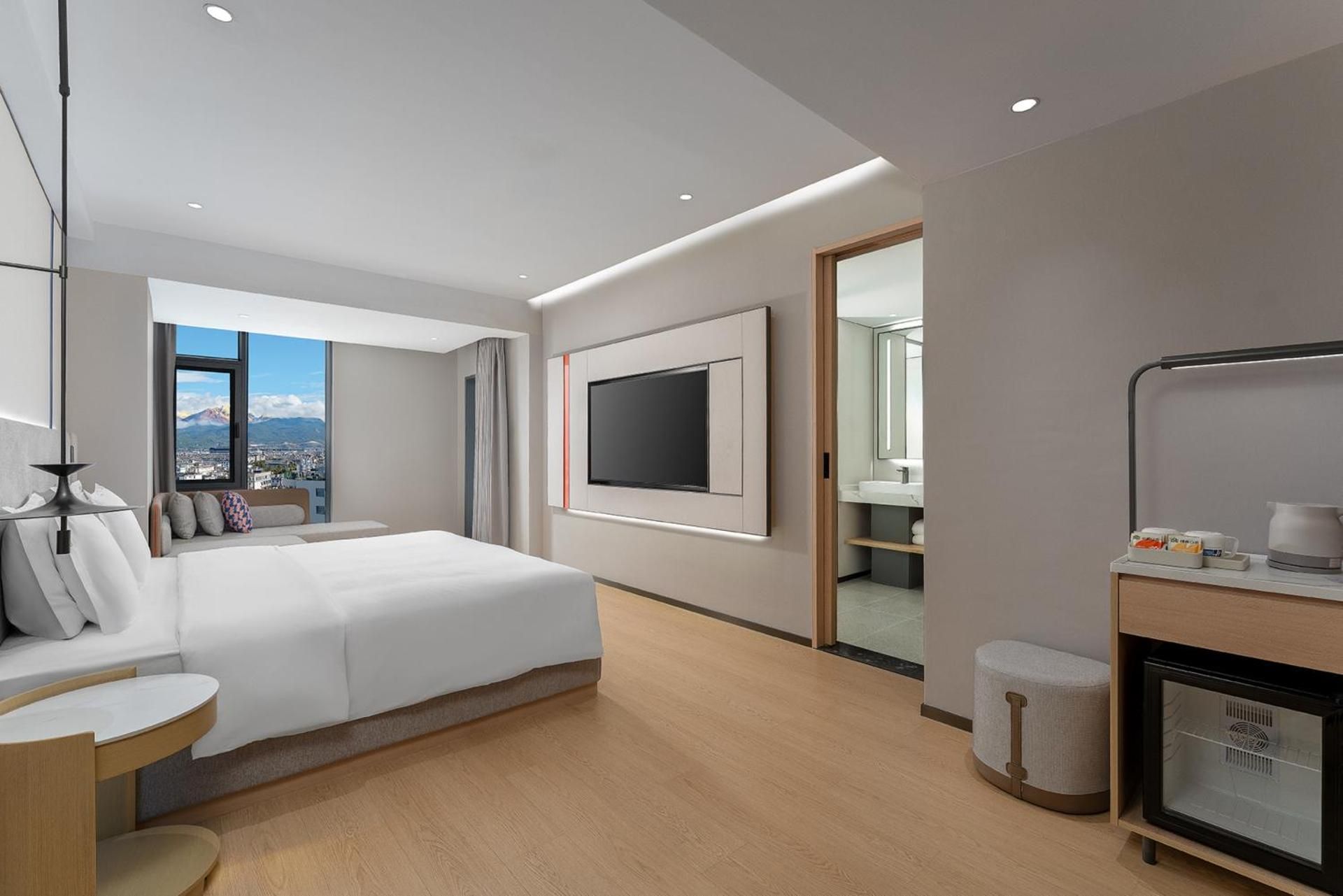 King Suite with Balcony and Snow Mountain View