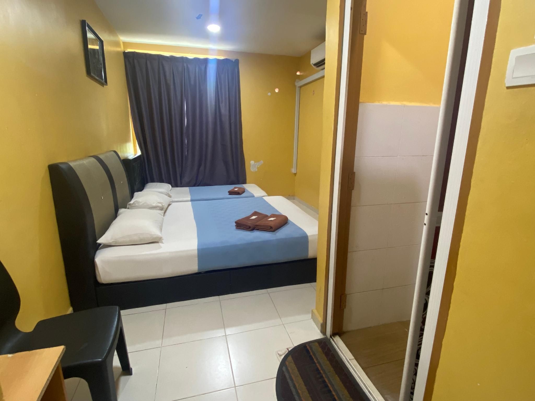 Hotel O De Anjung Standard Triple 2