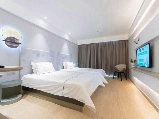 Magnotel - Yushu Bed Room