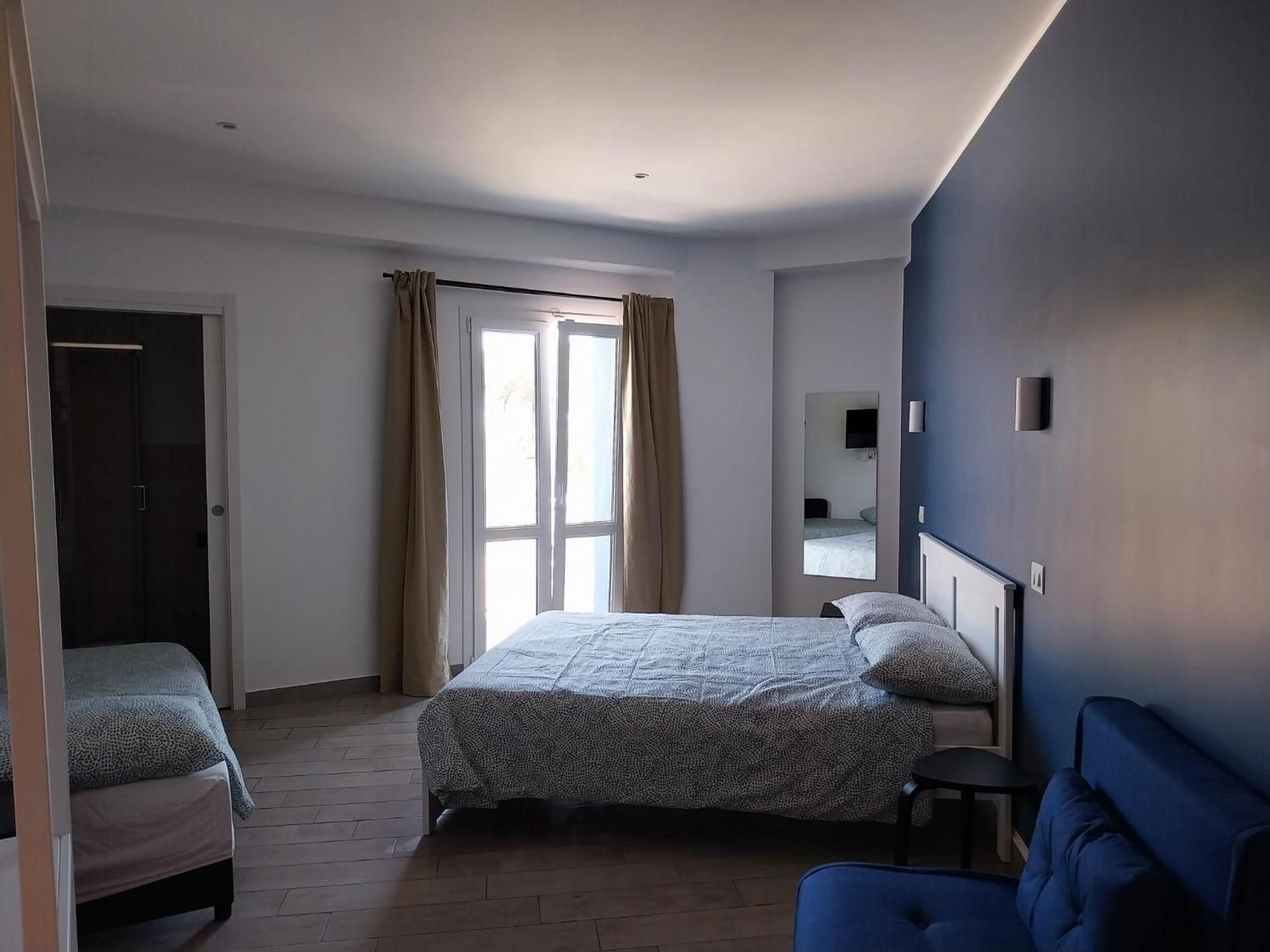 Quadruple Room with Balcony