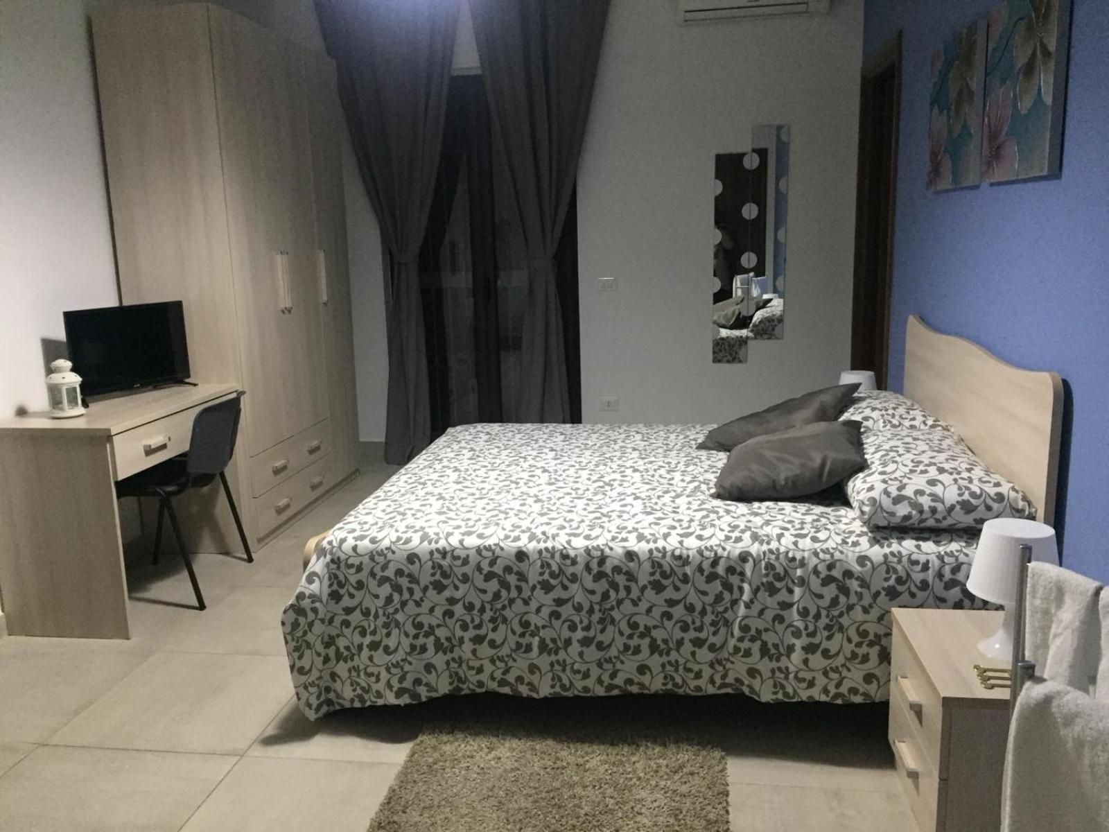 Quadruple Room with Private Bathroom