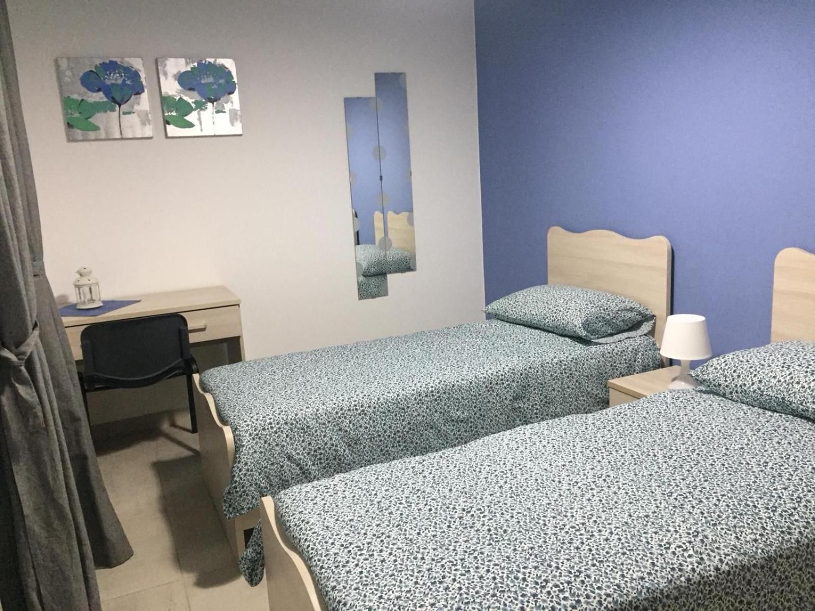 Quadruple Room with Private Bathroom
