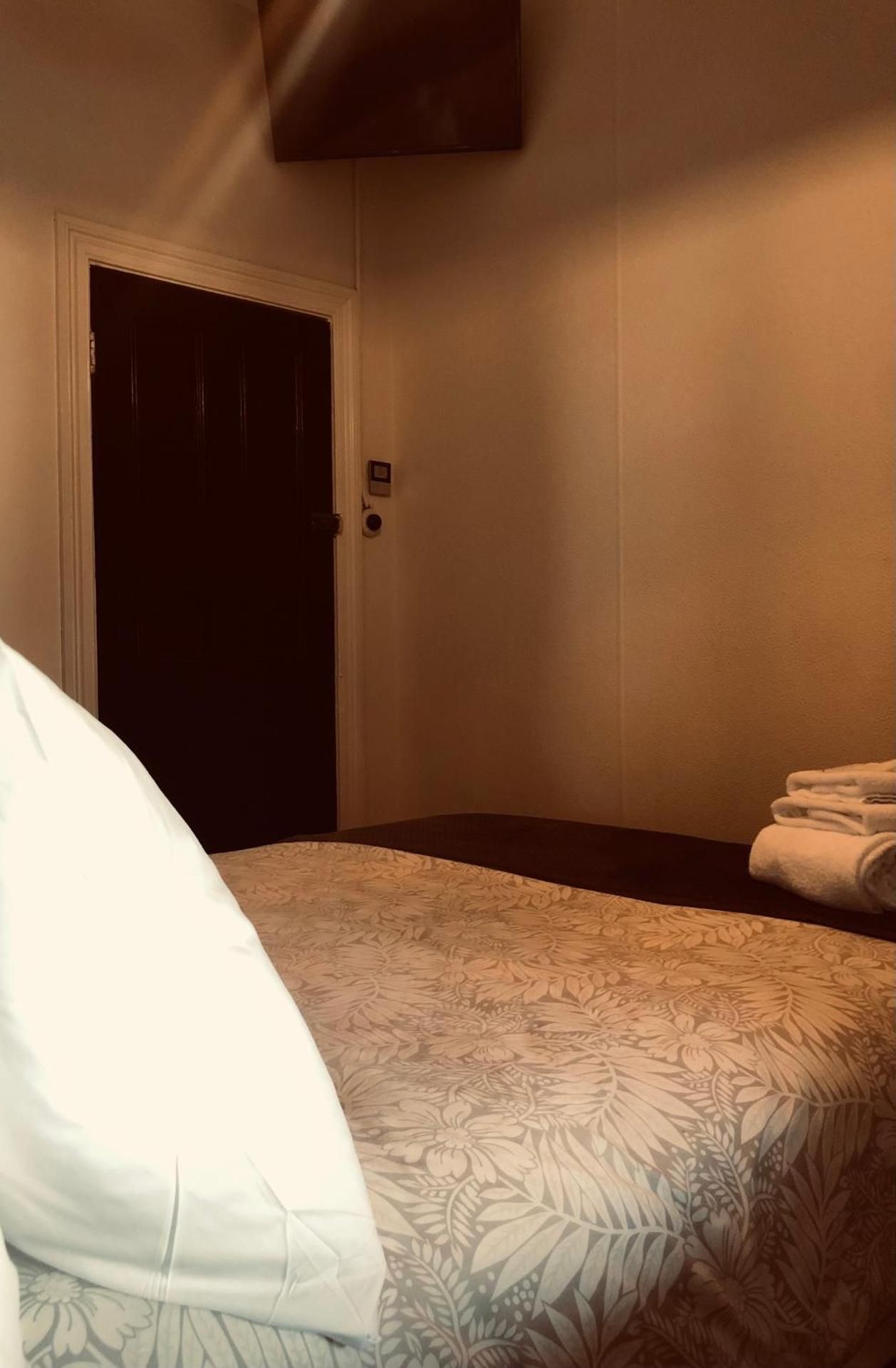 Queen Room with Shared Bathroom