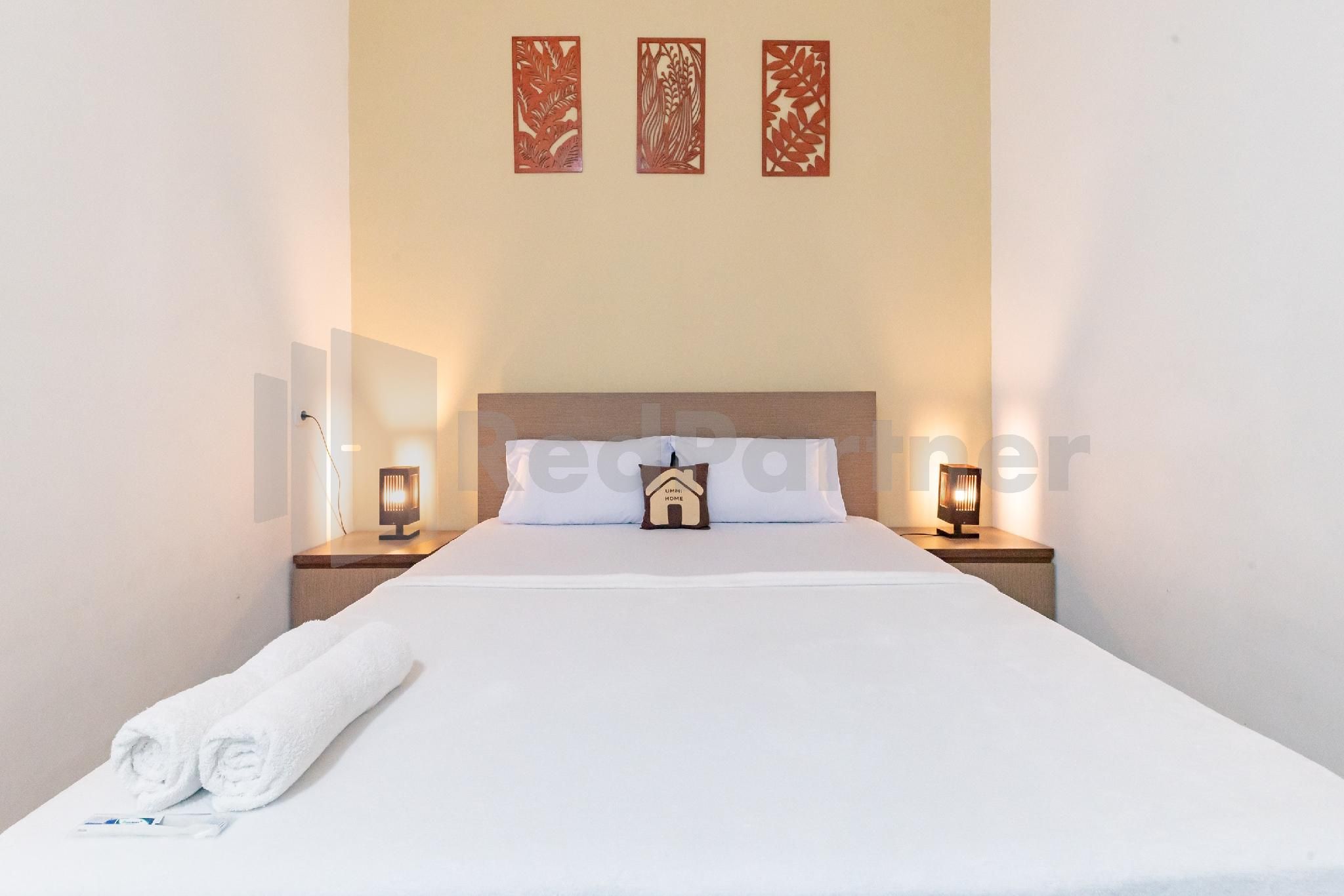 Ummi Home Syariah Mitra RedDoorz Deluxe Room 2