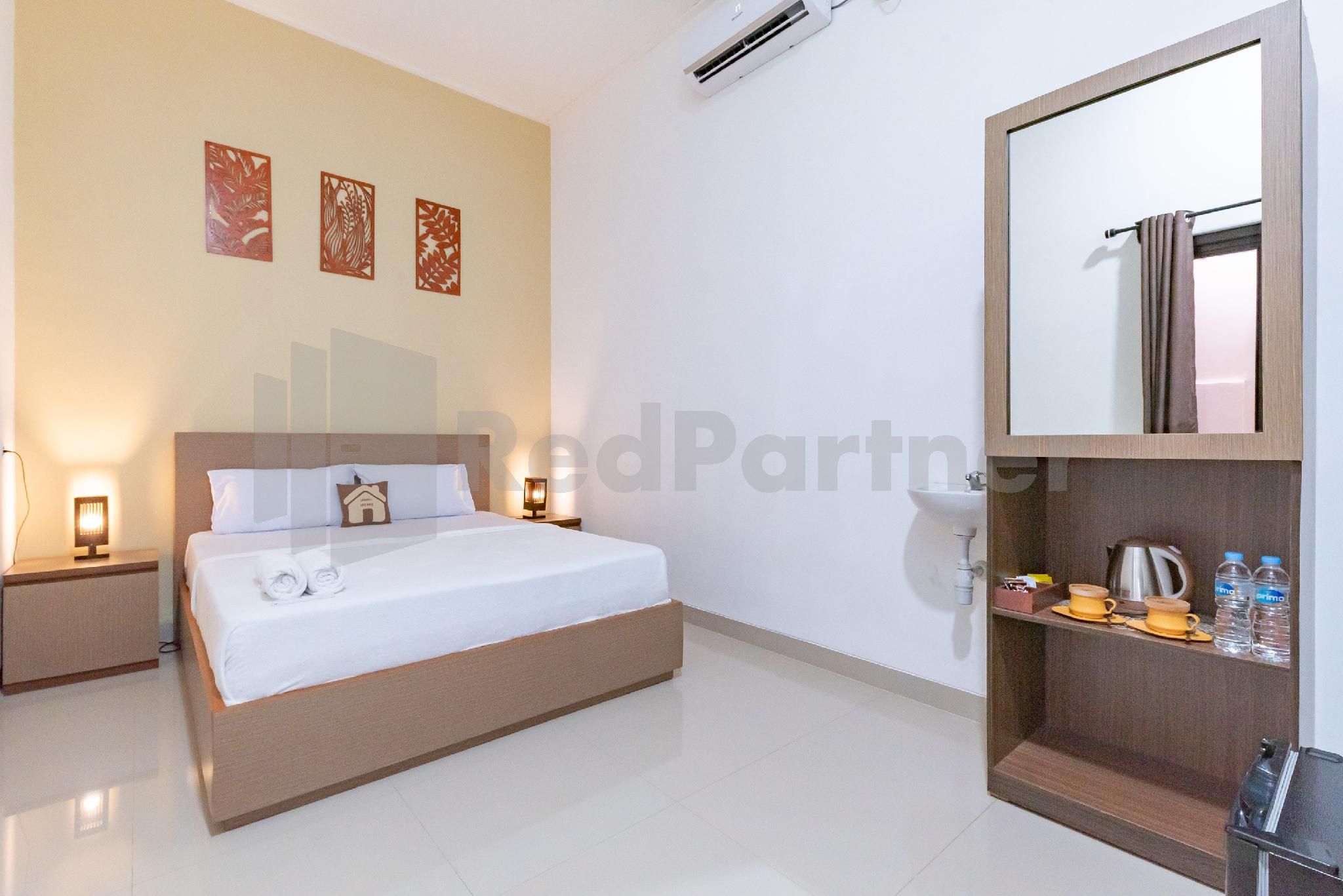 Ummi Home Syariah Mitra RedDoorz Deluxe Room