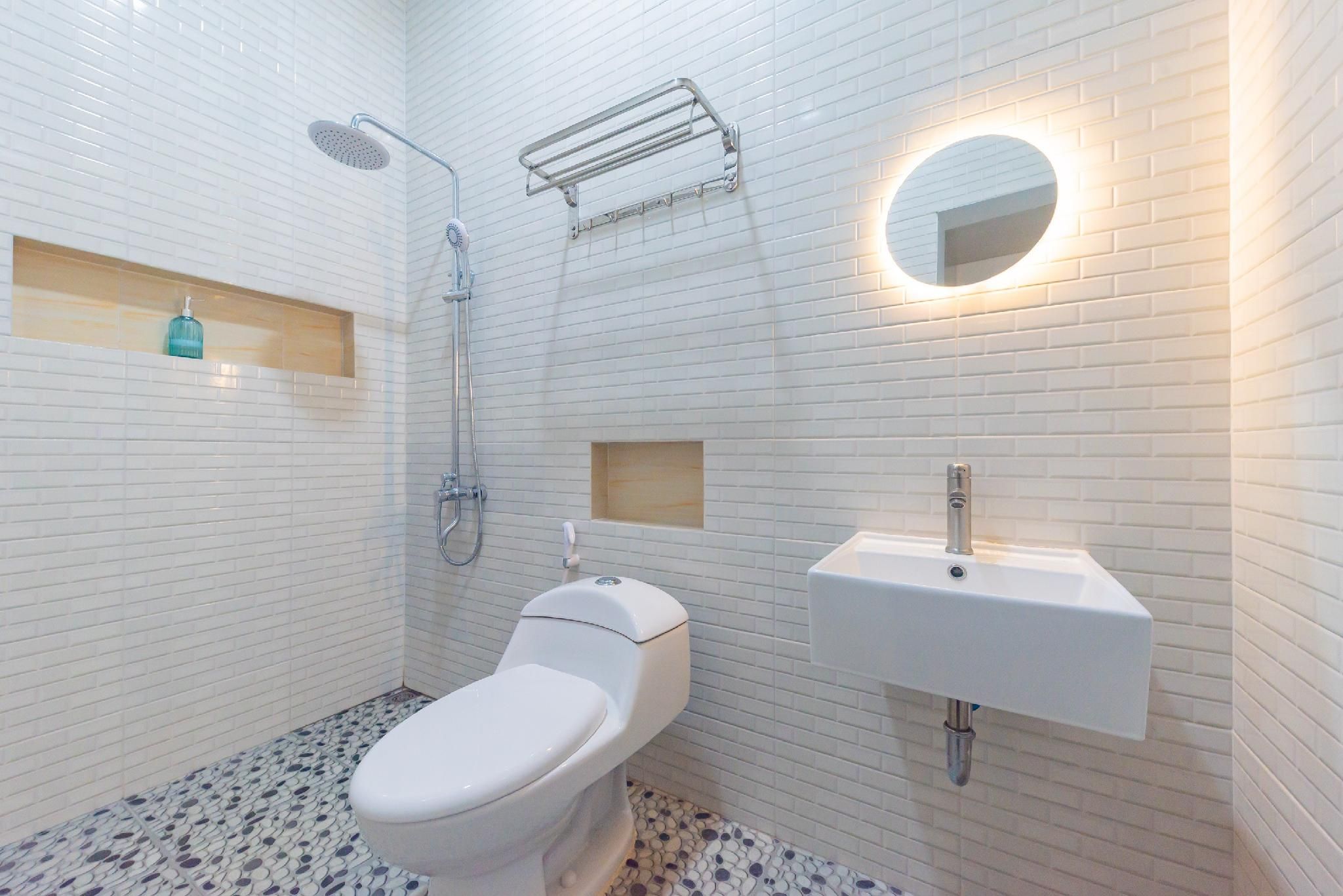 Sans Hotel Sky Home Syariah Tegal Deluxe Room 3