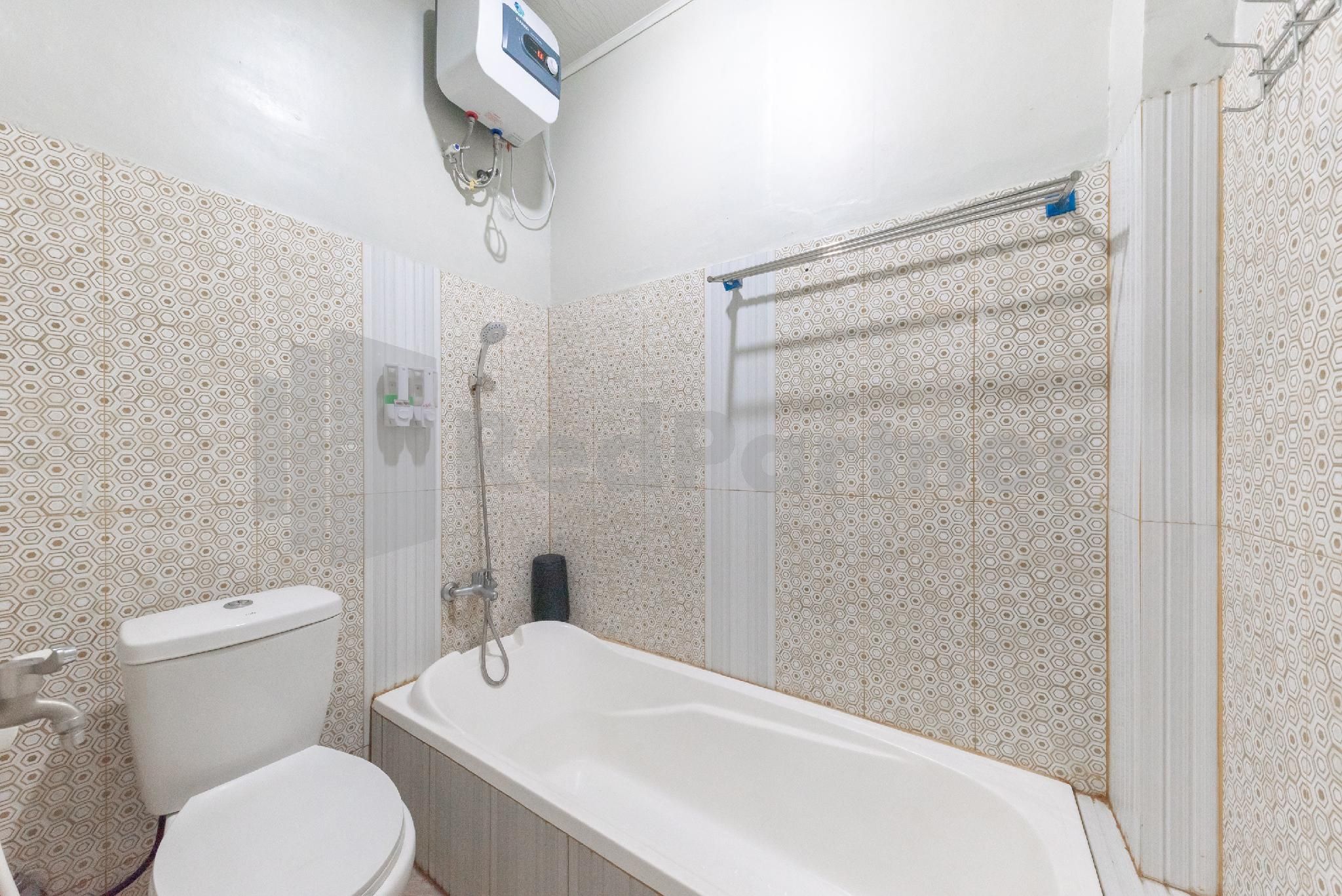 Rifal Inn Mitra RedDoorz Suite 3