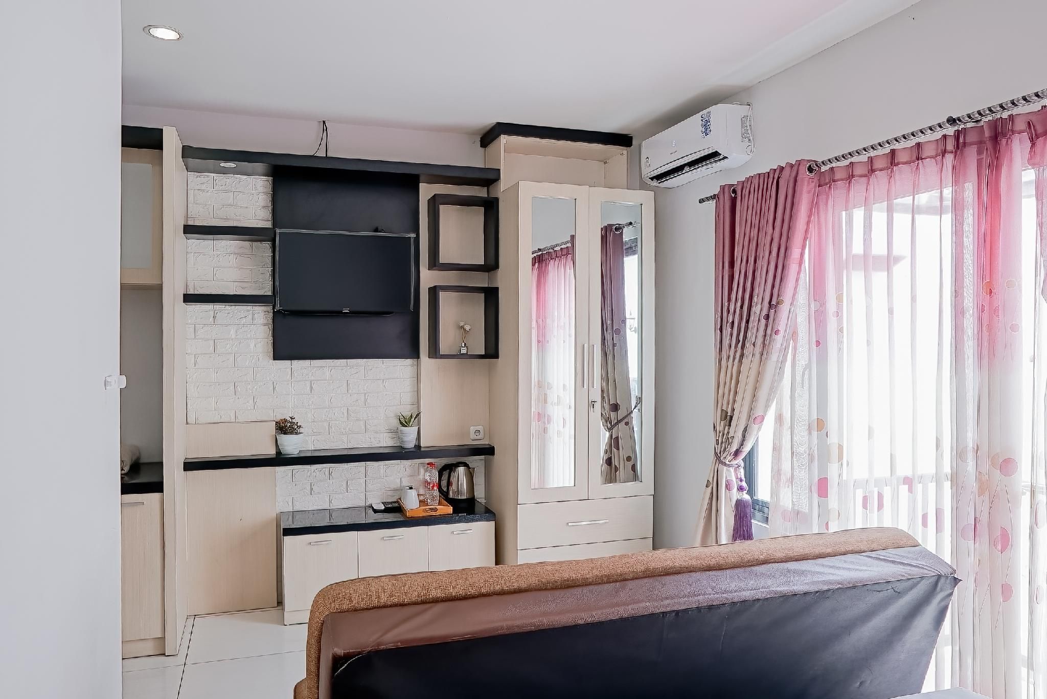 Jember Town Square Apartment by Calli Rooms Studio Executive