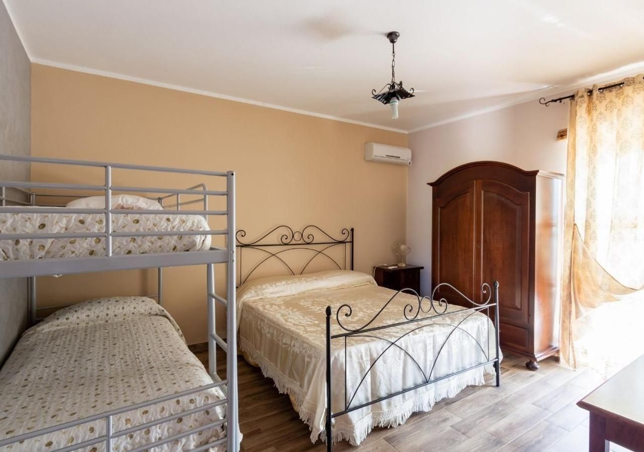 Quadruple Room with Private Bathroom