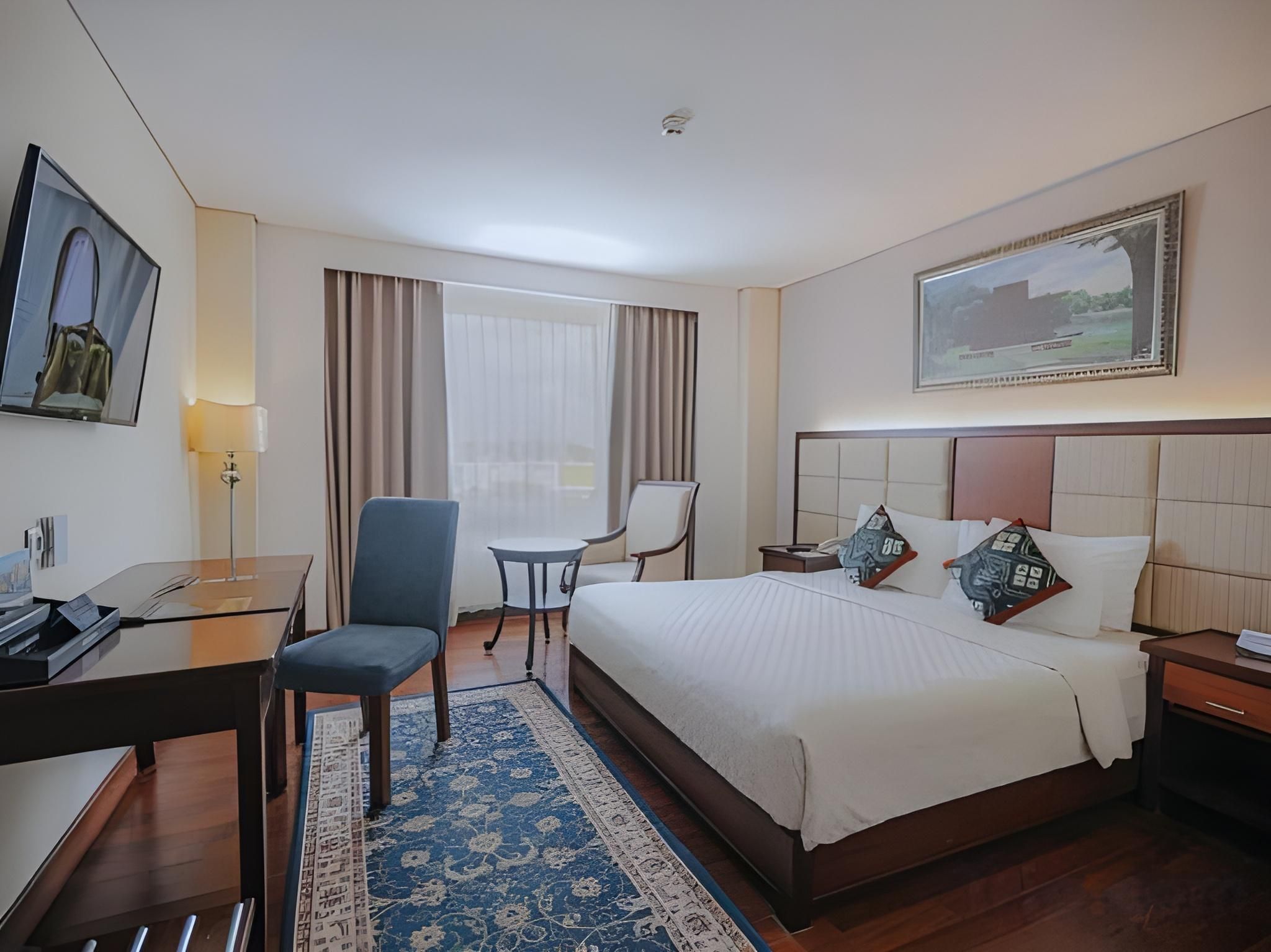 Grand Qin Hotel Syariah Deluxe Double Smoking