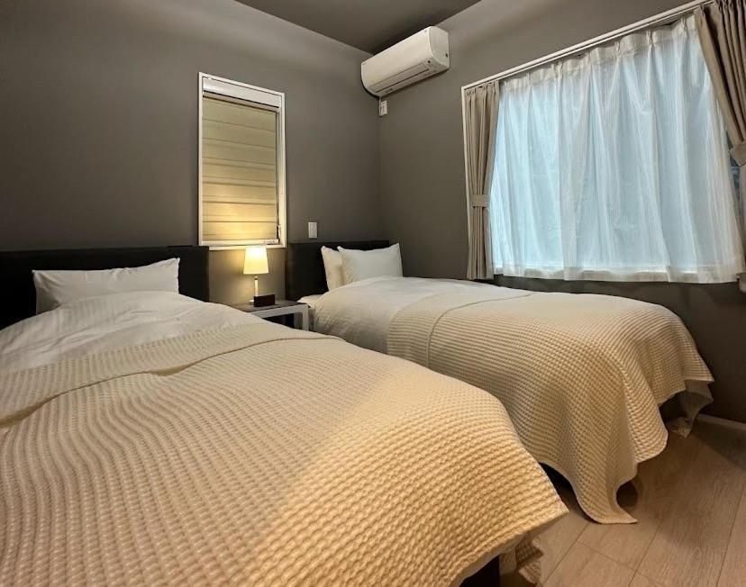 Quadruple Room with Private Bathroom