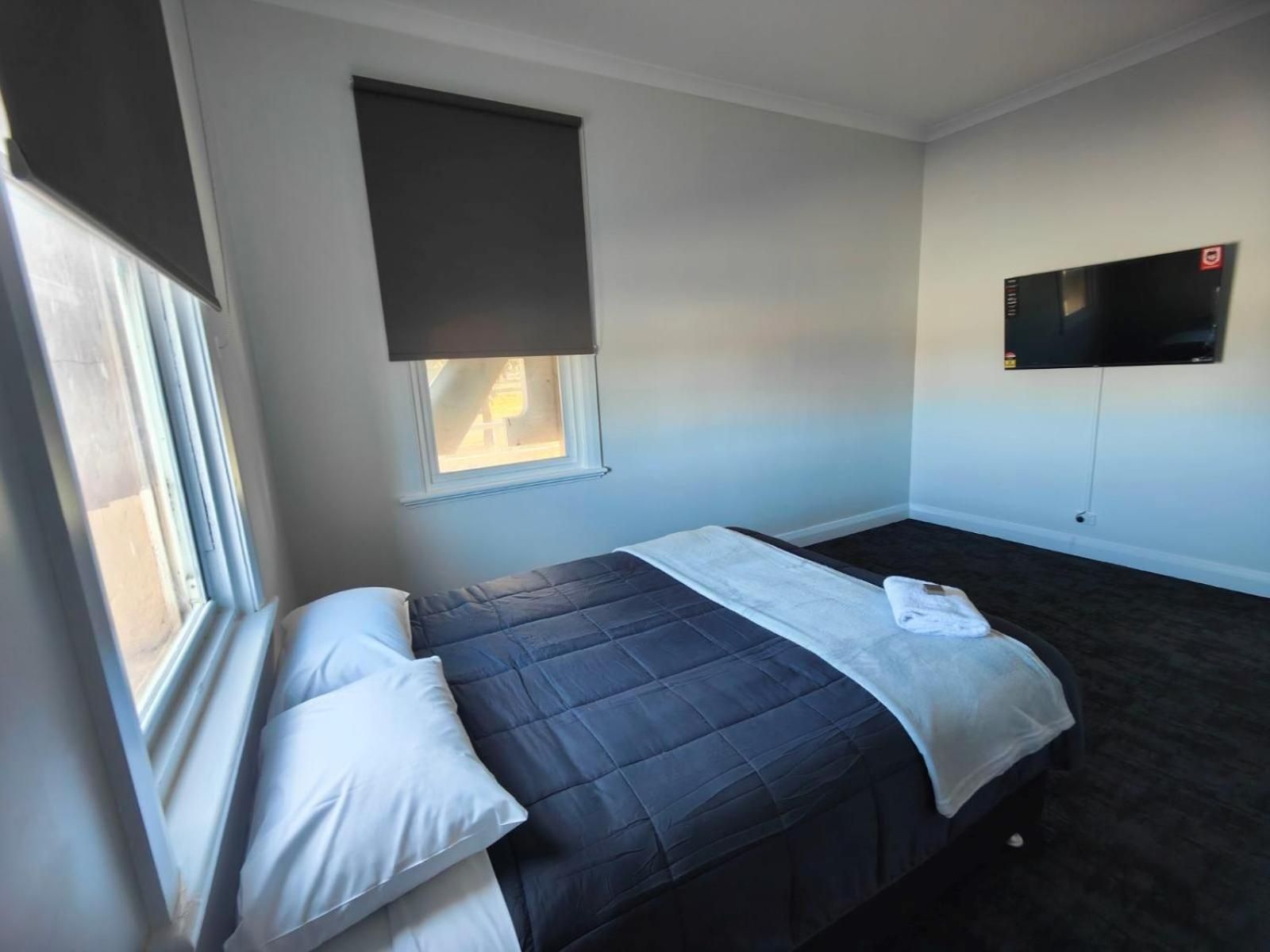 Queen Room with Shared Bathroom