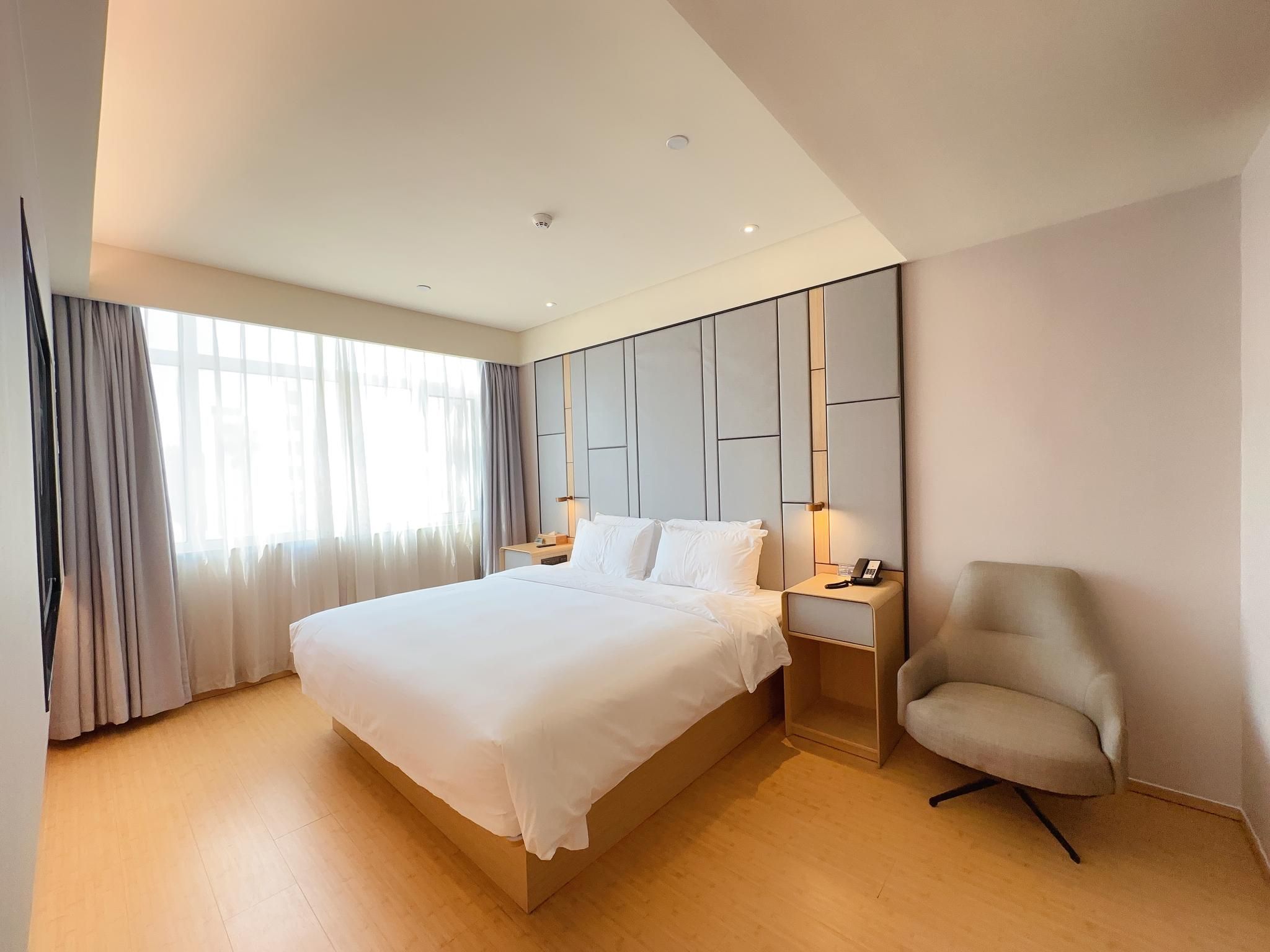 Hanting Hotel Rizhao Railway Station                                                       Deluxe Family Room, Guest room