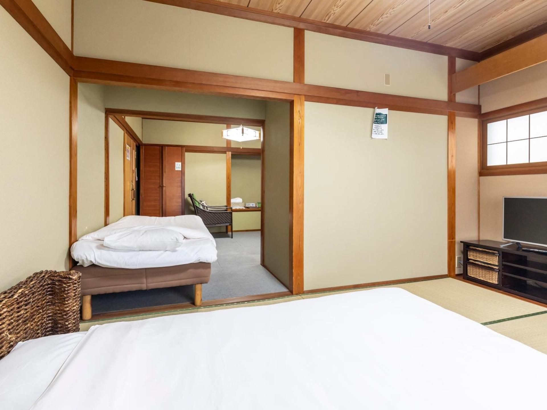 Quadruple Room with Shared Bathroom