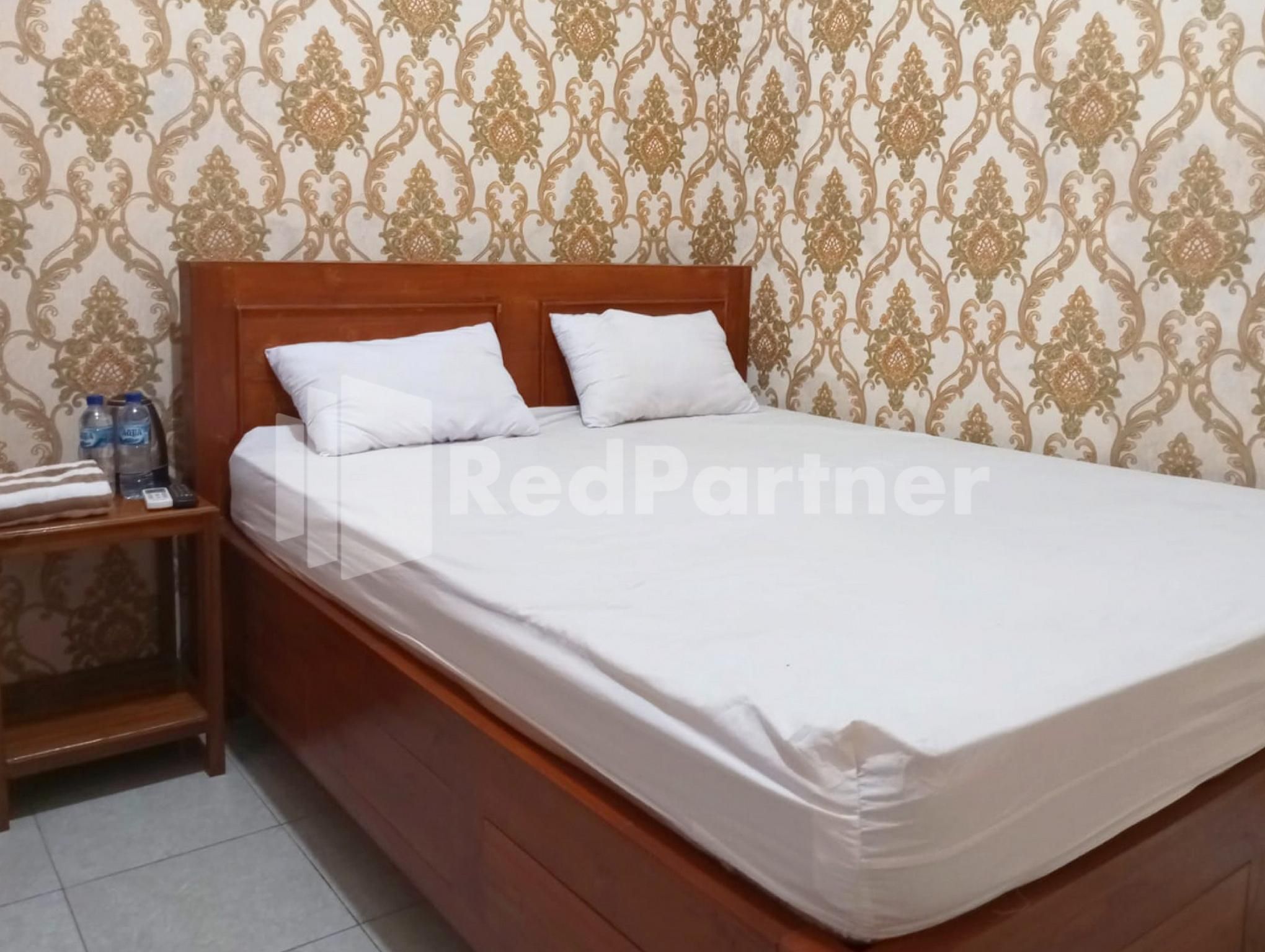 Isa Homestay Kudus Mitra Reddoorz Standard Room 2