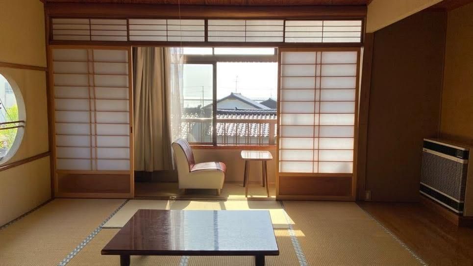 Quadruple Room with Shared Bathroom