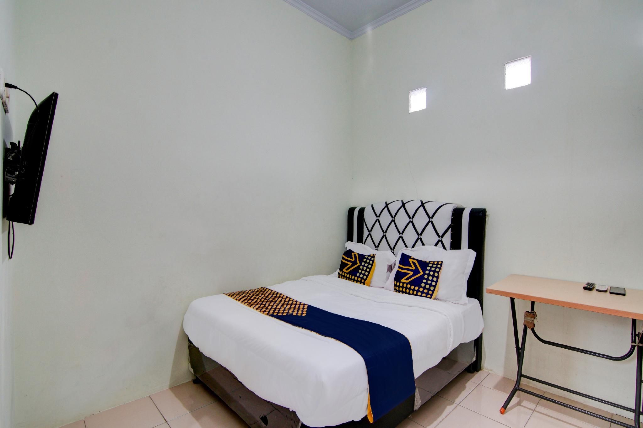 Hotel O Awi Stay Syariah Near SIMPANG KAWASAN INDUSTRI WILMAR PELINTUNG Double Room without Air Conditioning 2