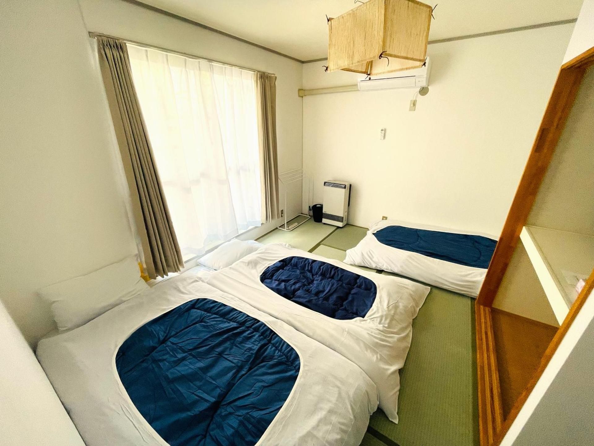 Triple Room with Shared Bathroom