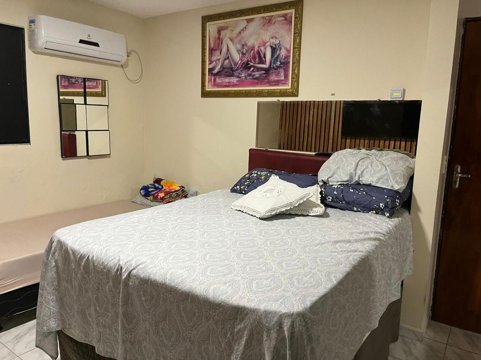 Basic Triple Room with Shared Bathroom
