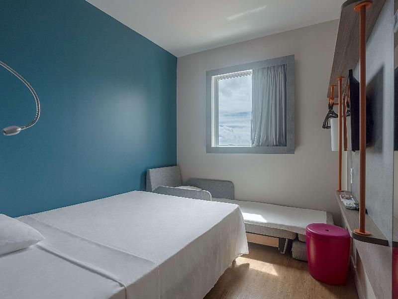Room With A Double Bed, Single Sofa Bed And Minibar