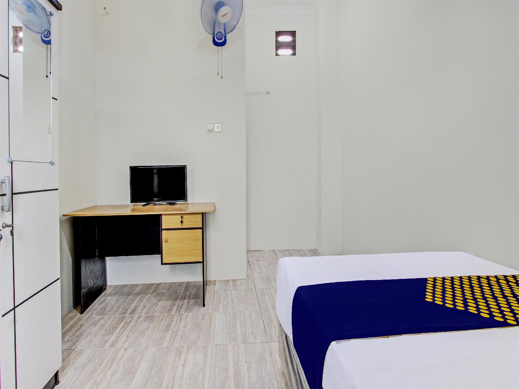Hotel O Kristin Homestay SPOT ON Room without Air Conditioning 3