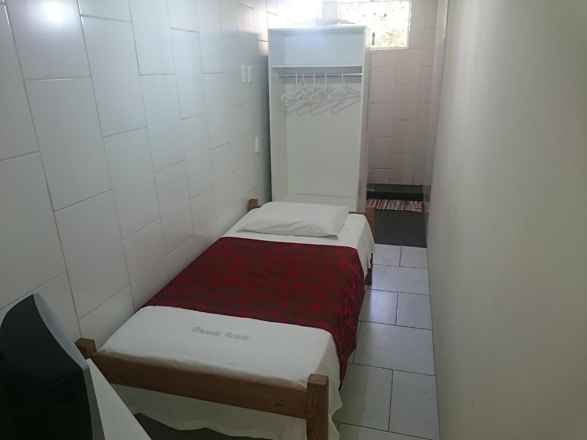 Small Single Room with a fan