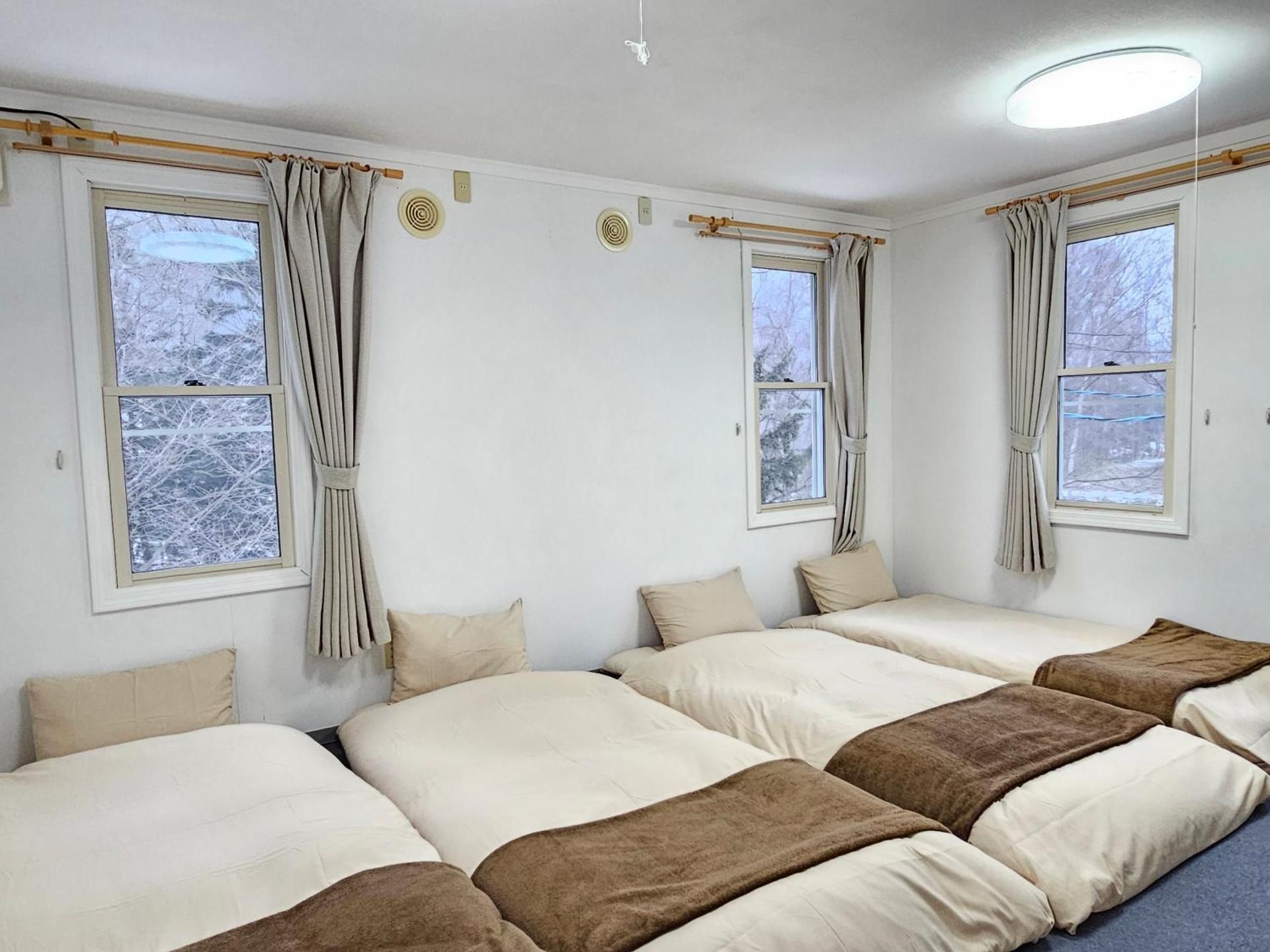 Economy Quadruple Room with Shared Bathroom