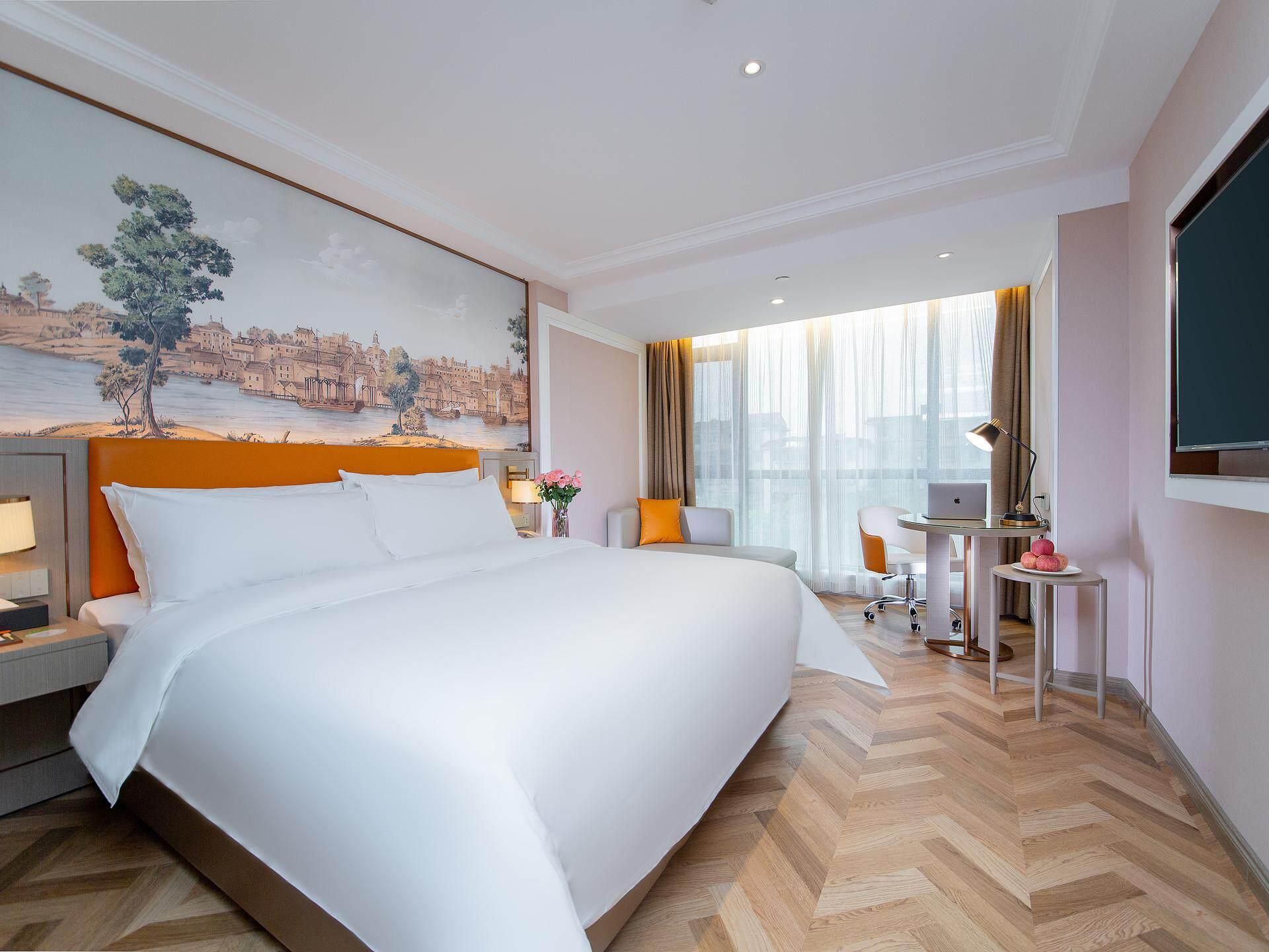 Vienna Hotel Jingzhou Development Zone Olympic Sports Center Deluxe Queen Room