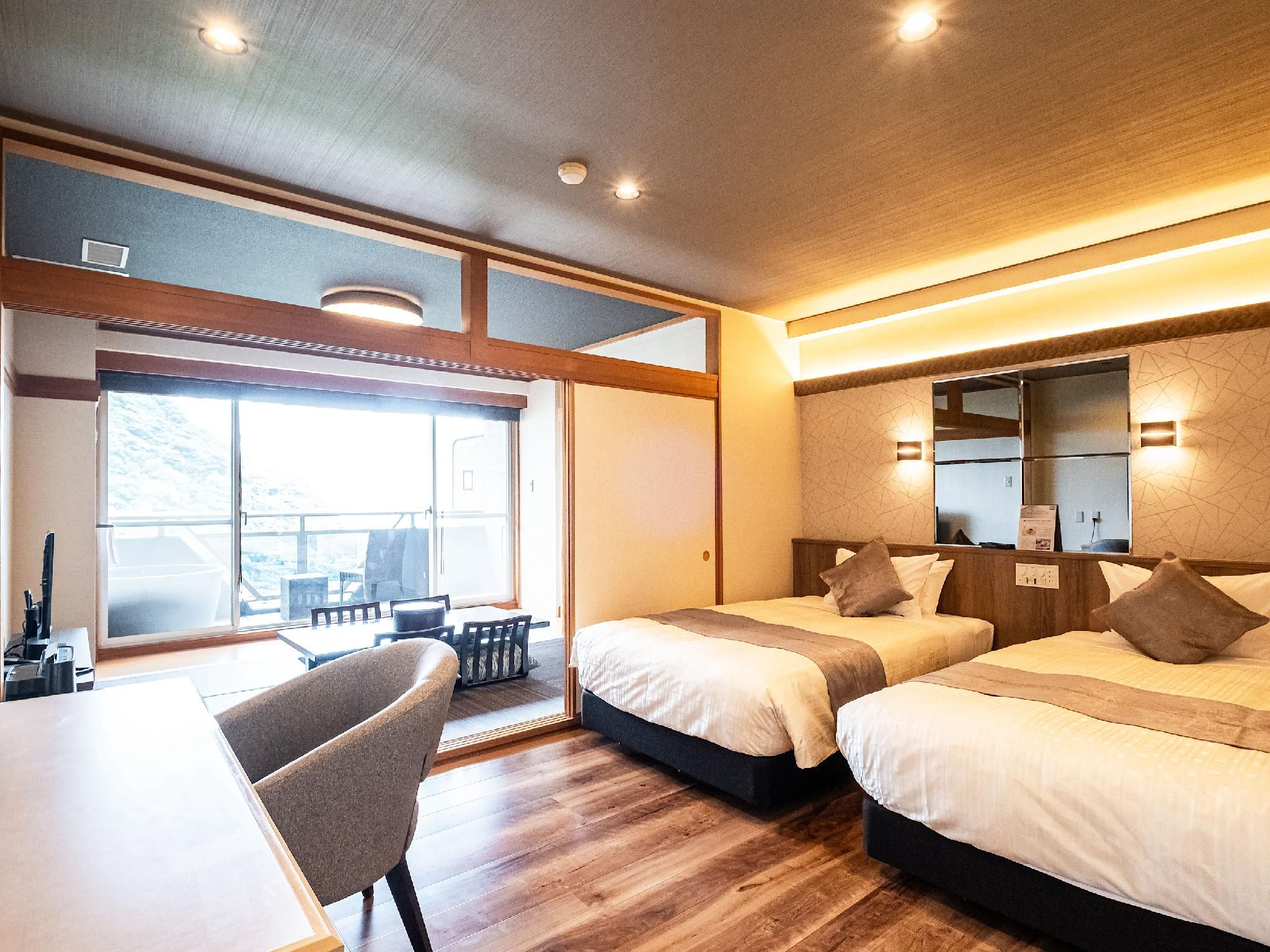 Modern Japanese-Western Room with Open-Air Rock Bath
