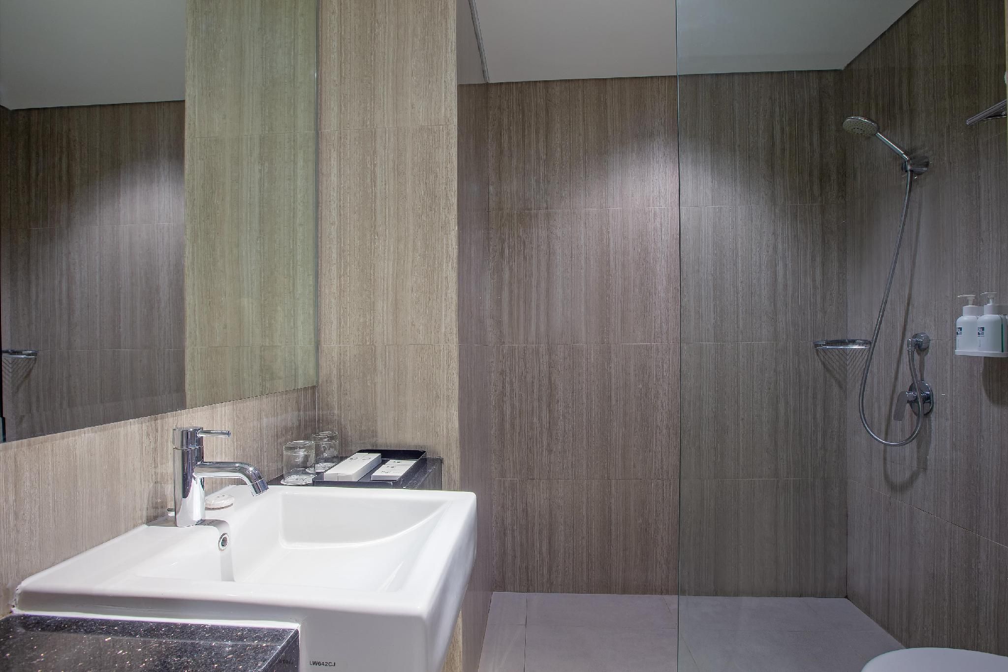 Swiss-Belinn Timika Deluxe Pool Access Room 3