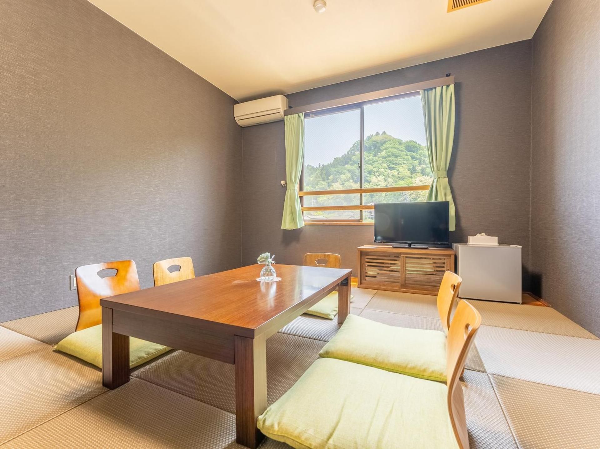 Quadruple Room with Shared Bathroom