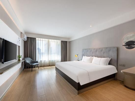 Magnotel - Yushu Bed Room