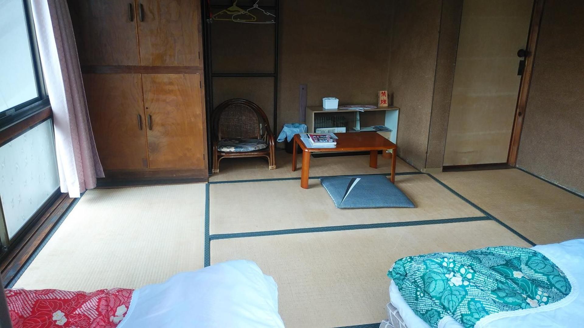 Single Bed in Male Dormitory Room with Shared Bathroom