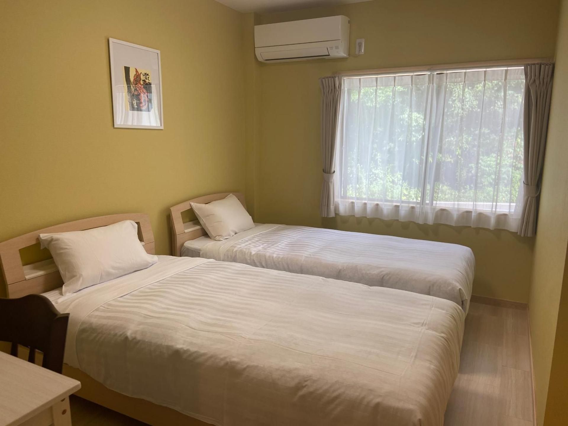 Twin Room with Private Bathroom
