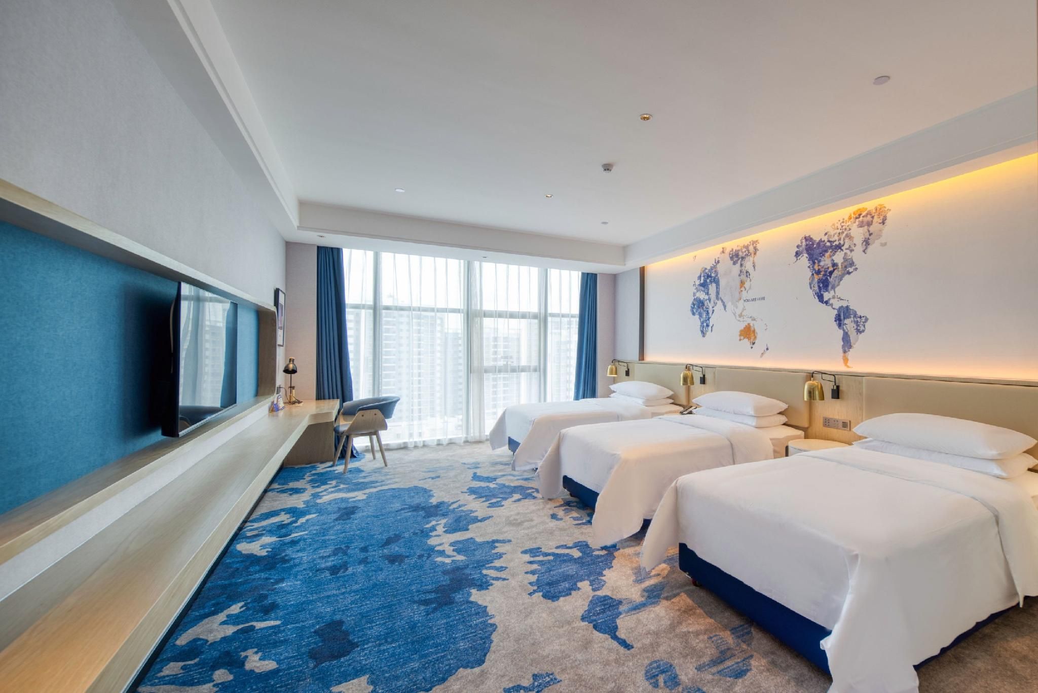 Kyriad Marvelous Hotel Fangchenggang Administrative Center High-speed Railway Station WH - Lexiang Family Triple Room 2