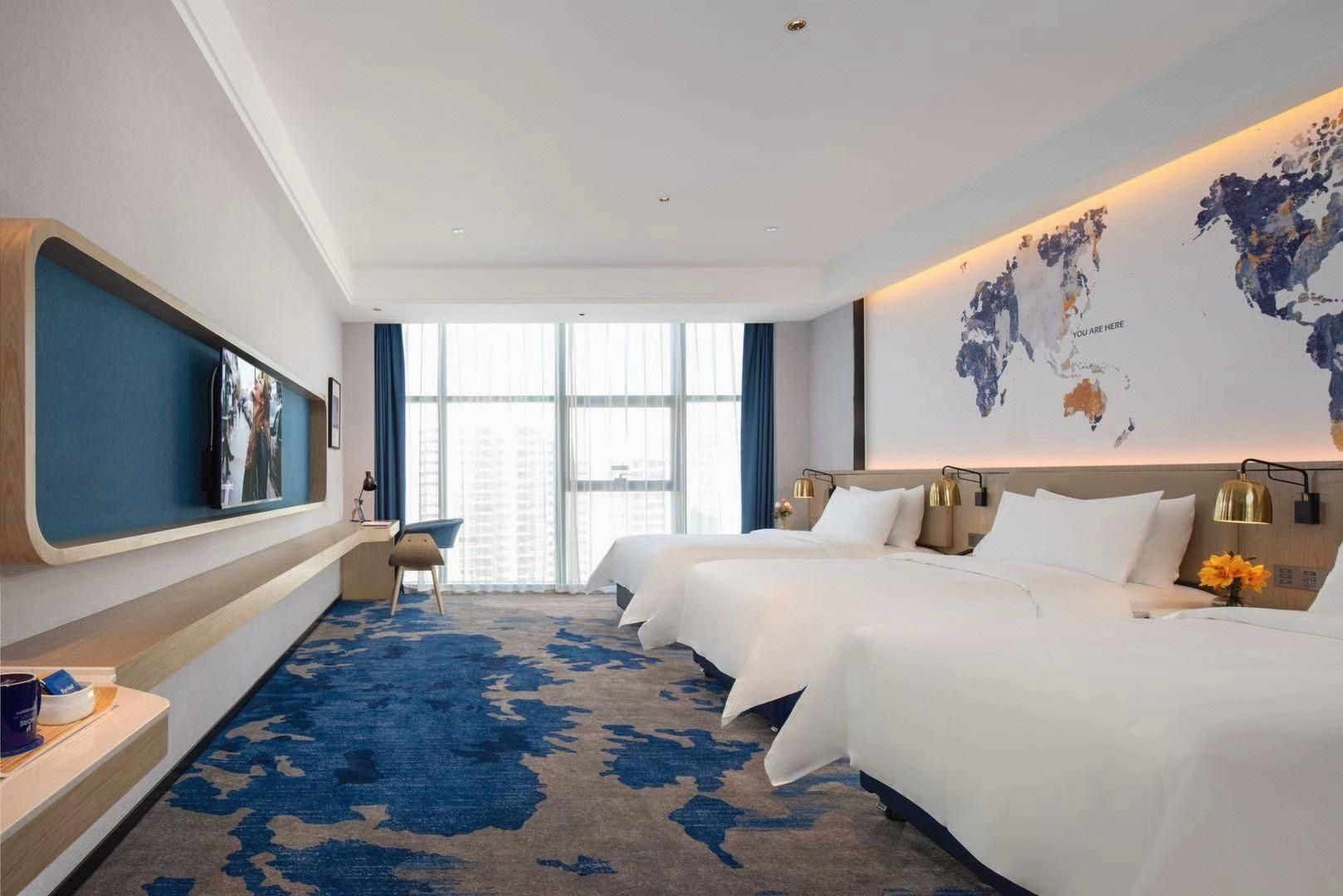 Kyriad Marvelous Hotel Fangchenggang Administrative Center High-speed Railway Station WH - Lexiang Family Triple Room