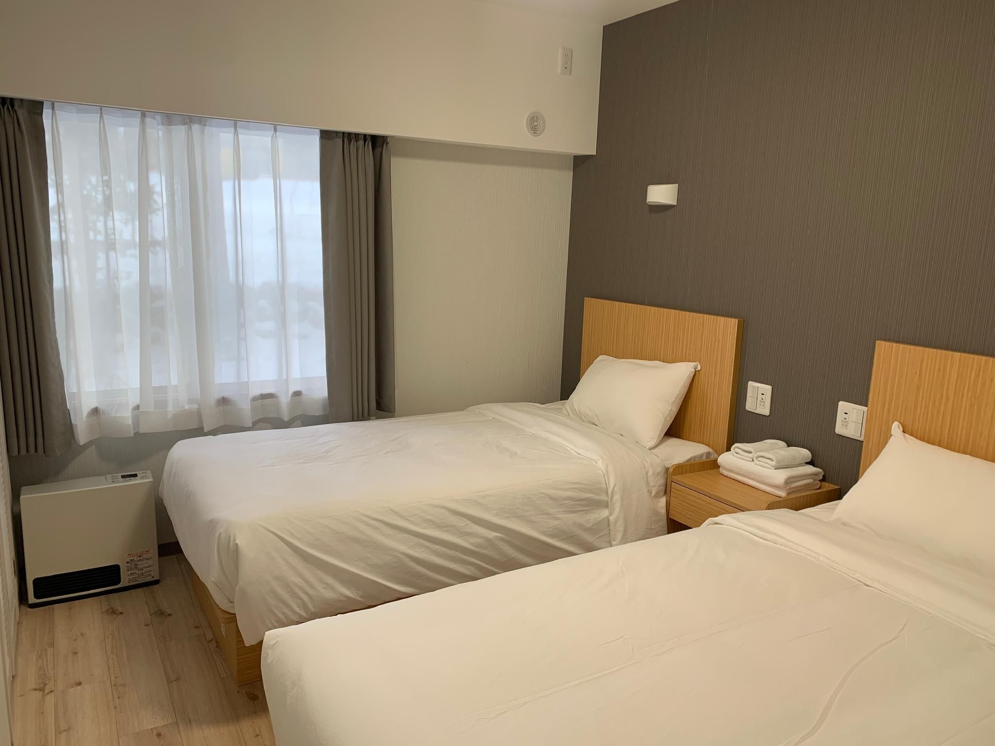Twin Suite with Balcony - Non-Smoking