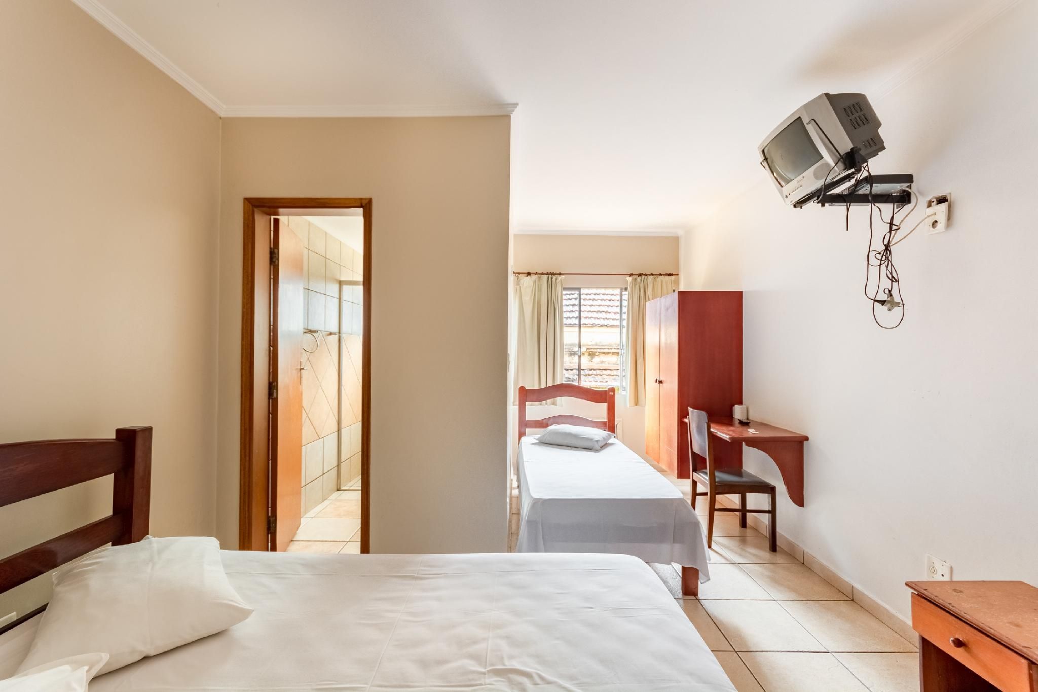 Quadruple Room (1 Double bed + 2 Single beds)