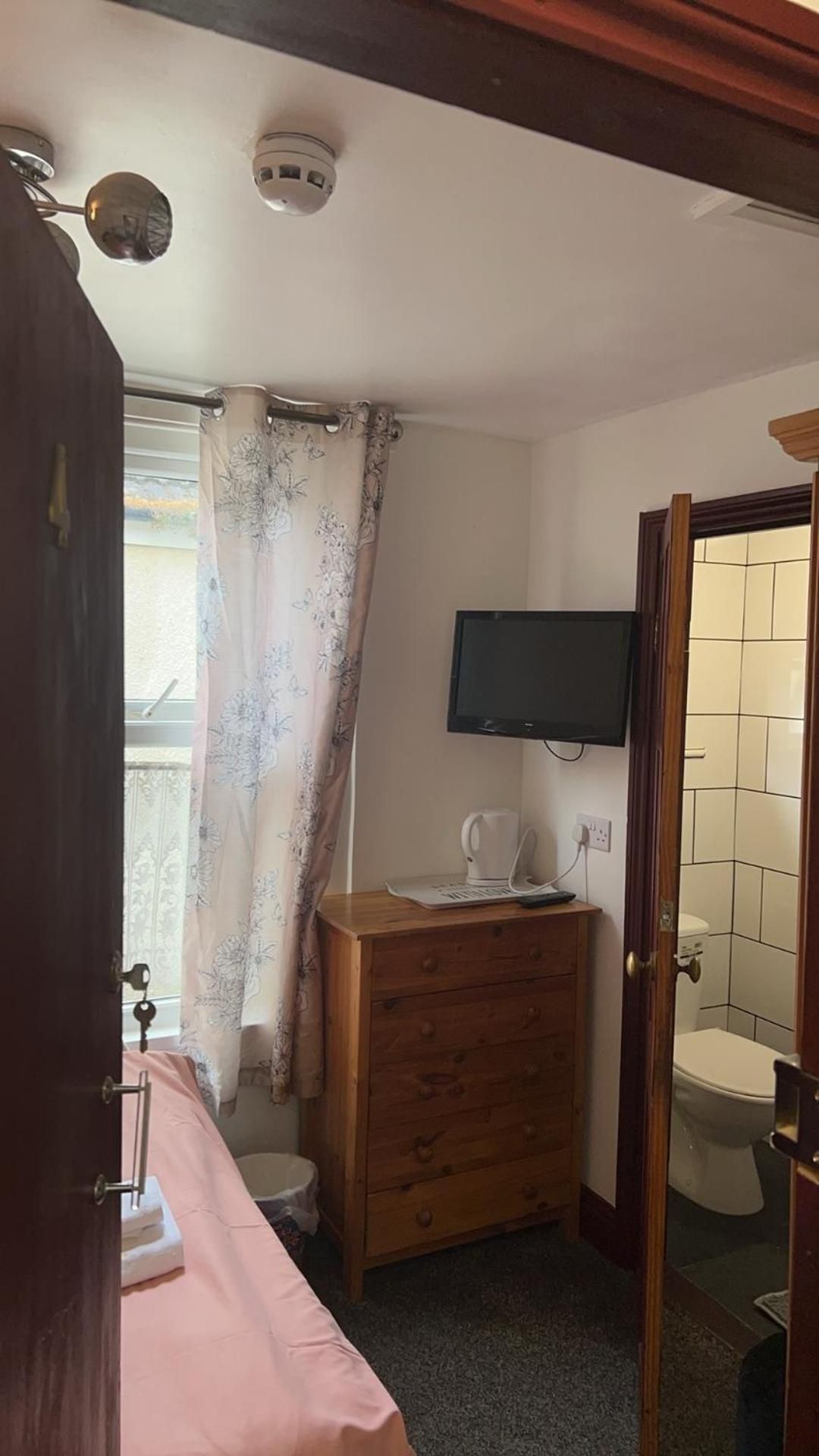 Single Room with Shared Shower and Toilet