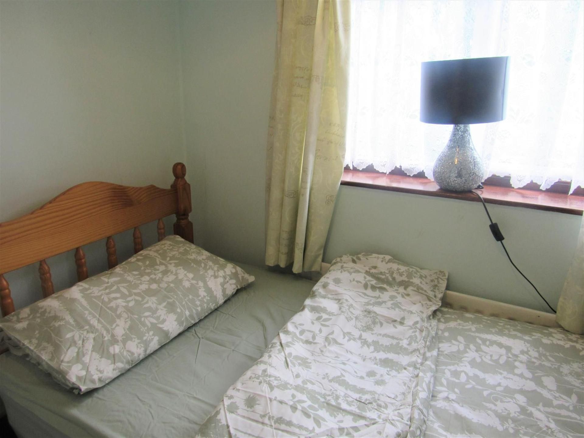 Single Room with Shared Shower and Toilet